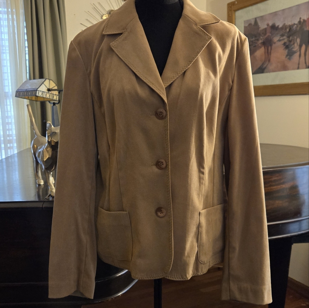 Camel colored blazer.